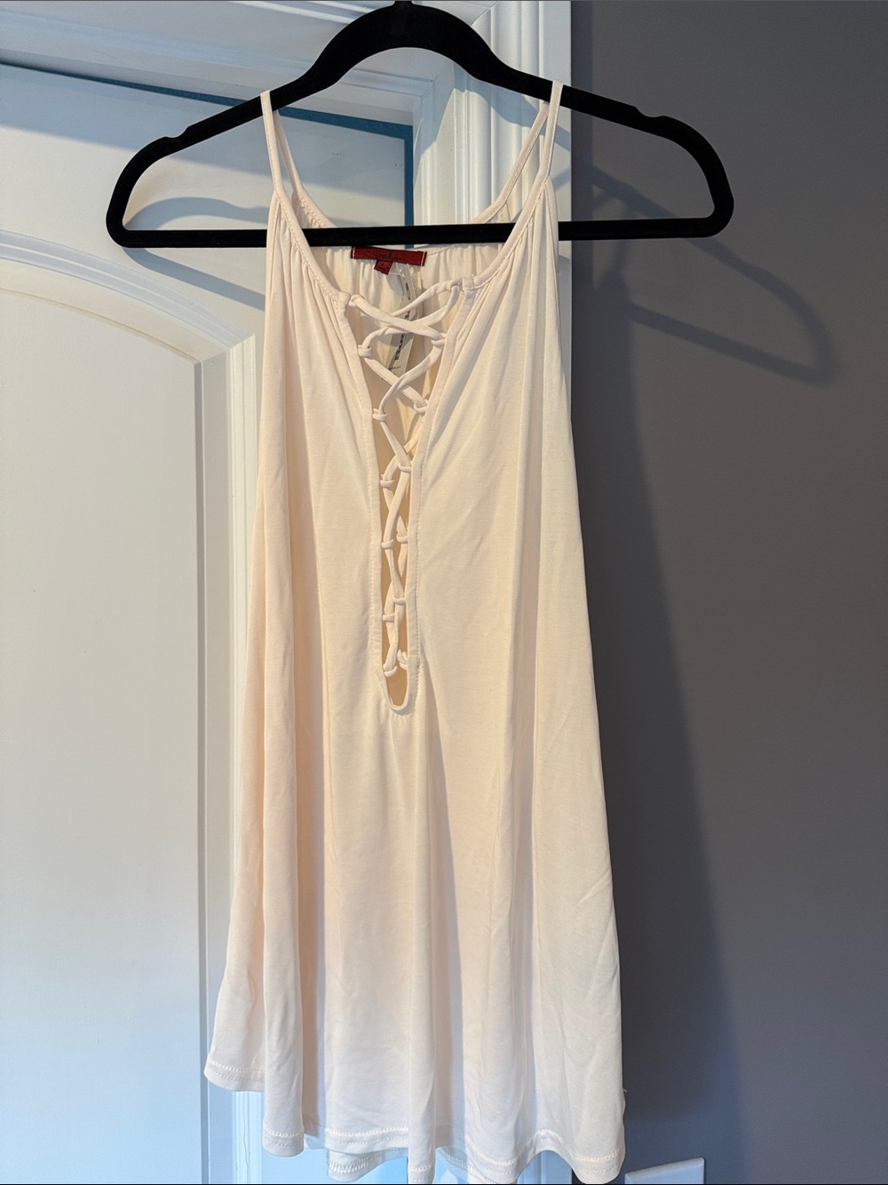 Lace-Up Cream Sleeveless tank from the Buckle